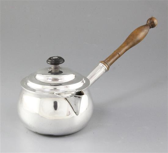 A George III Irish silver brandy pan and cover, by James Le Bass, length 310mm, gross weight 18.8oz/585grms.